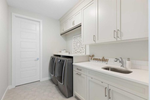 143 Marina Landing Se, Calgary, AB - Indoor Photo Showing Laundry Room