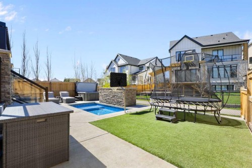 143 Marina Landing Se, Calgary, AB - Outdoor With In Ground Pool