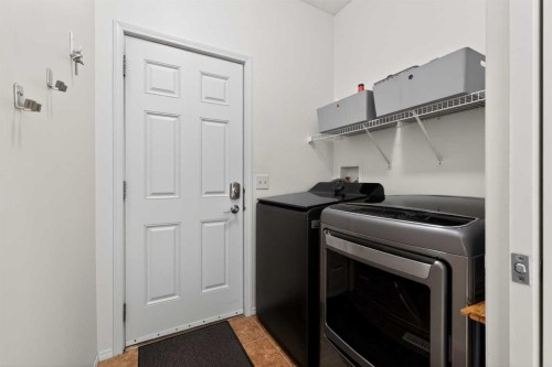 261 Copperstone Terrace Se, Calgary, AB - Indoor Photo Showing Laundry Room