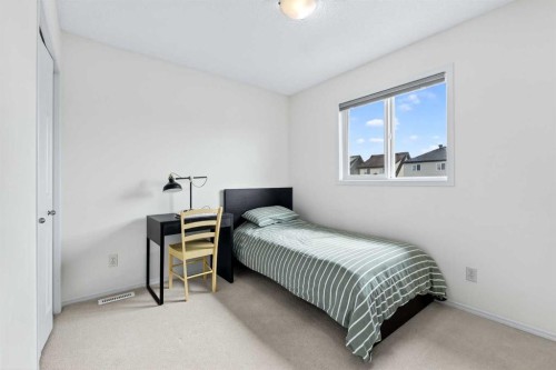 261 Copperstone Terrace Se, Calgary, AB - Indoor Photo Showing Bedroom