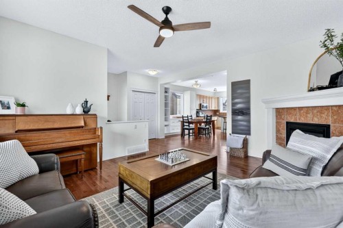 261 Copperstone Terrace Se, Calgary, AB - Indoor Photo Showing Living Room With Fireplace