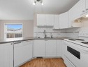 128 Taradale Drive Ne, Calgary, AB  - Indoor Photo Showing Kitchen With Double Sink 