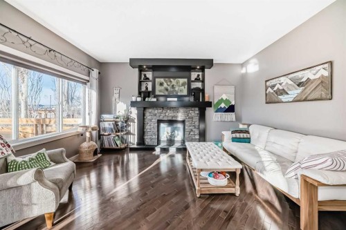 93 Williamstown Green Nw, Airdrie, AB - Indoor Photo Showing Living Room With Fireplace