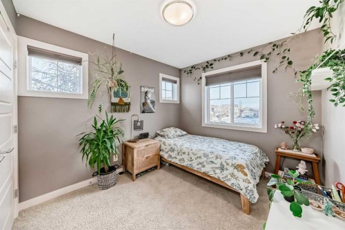 93 Williamstown Green Nw, Airdrie, AB - Indoor Photo Showing Bedroom