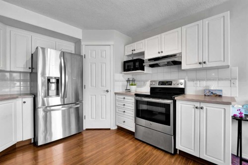 60 Arbour Crest Terrace Nw, Calgary, AB - Indoor Photo Showing Kitchen With Stainless Steel Kitchen