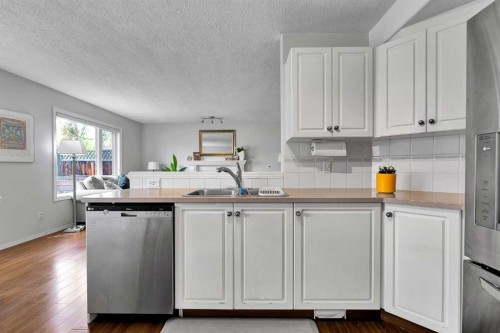 60 Arbour Crest Terrace Nw, Calgary, AB - Indoor Photo Showing Kitchen With Double Sink