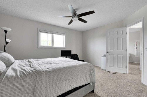 60 Arbour Crest Terrace Nw, Calgary, AB - Indoor Photo Showing Bedroom