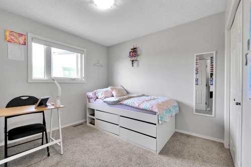 60 Arbour Crest Terrace Nw, Calgary, AB - Indoor Photo Showing Bedroom