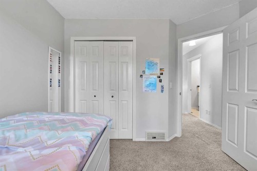 60 Arbour Crest Terrace Nw, Calgary, AB - Indoor Photo Showing Bedroom