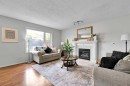 60 Arbour Crest Terrace Nw, Calgary, AB  - Indoor Photo Showing Living Room With Fireplace 