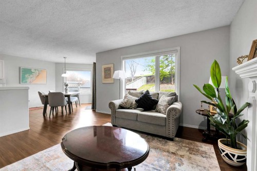 60 Arbour Crest Terrace Nw, Calgary, AB - Indoor Photo Showing Living Room