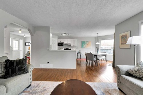 60 Arbour Crest Terrace Nw, Calgary, AB - Indoor Photo Showing Living Room
