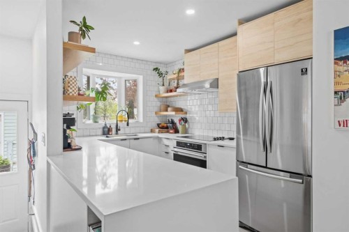 240 Lynnview Way Se, Calgary, AB - Indoor Photo Showing Kitchen With Upgraded Kitchen