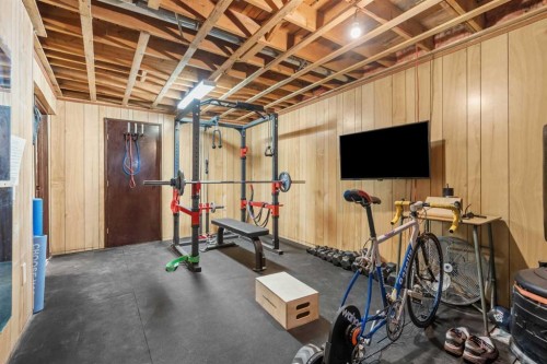 240 Lynnview Way Se, Calgary, AB - Indoor Photo Showing Gym Room