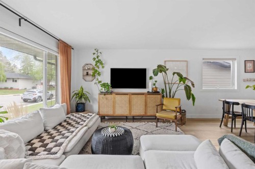 240 Lynnview Way Se, Calgary, AB - Indoor Photo Showing Living Room