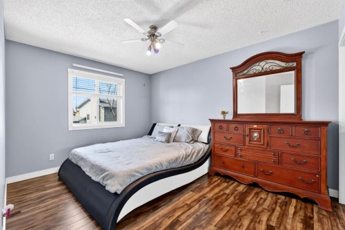 29 Sundown Way Se, Calgary, AB - Indoor Photo Showing Bedroom