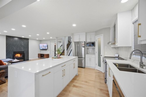 158 Shawbrooke Green Sw, Calgary, AB - Indoor Photo Showing Kitchen With Double Sink With Upgraded Kitchen