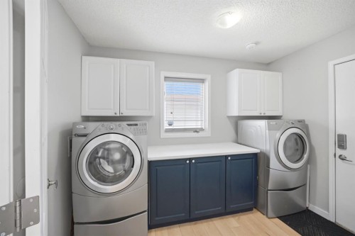 158 Shawbrooke Green Sw, Calgary, AB - Indoor Photo Showing Laundry Room