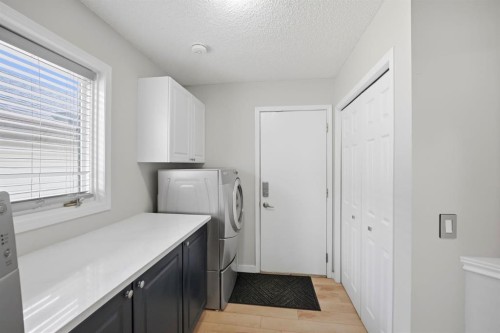 158 Shawbrooke Green Sw, Calgary, AB - Indoor Photo Showing Laundry Room