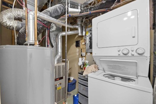 185 Shawbrooke Green Sw, Calgary, AB - Indoor Photo Showing Laundry Room