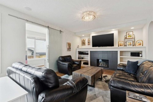 2015 Brightoncrest Green Se, Calgary, AB - Indoor Photo Showing Living Room With Fireplace
