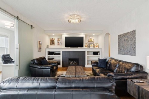 2015 Brightoncrest Green Se, Calgary, AB - Indoor Photo Showing Living Room With Fireplace