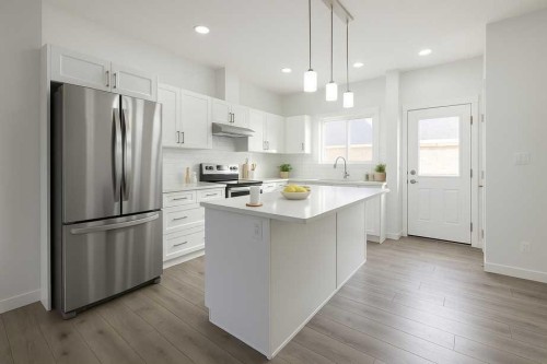 17 Tillotson Loop, Okotoks, AB - Indoor Photo Showing Kitchen With Upgraded Kitchen