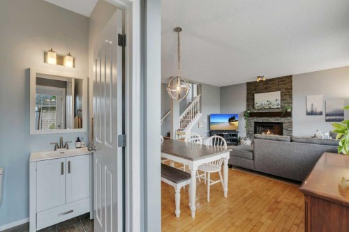 104 Prestwick Street Se, Calgary, AB - Indoor Photo Showing Other Room With Fireplace
