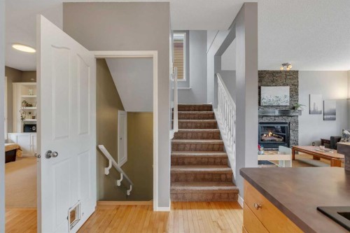 104 Prestwick Street Se, Calgary, AB - Indoor Photo Showing Other Room With Fireplace