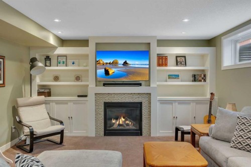 104 Prestwick Street Se, Calgary, AB - Indoor Photo Showing Living Room With Fireplace
