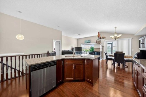 248 Rainbow Falls Way, Chestermere, AB - Indoor Photo Showing Kitchen With Double Sink