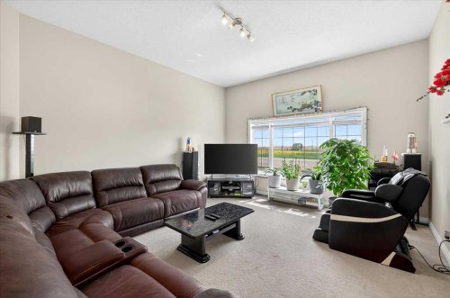 248 Rainbow Falls Way, Chestermere, AB - Indoor Photo Showing Living Room