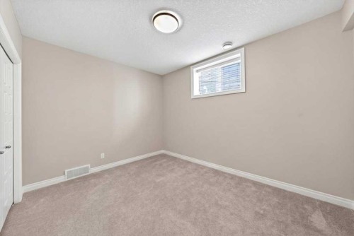 248 Rainbow Falls Way, Chestermere, AB - Indoor Photo Showing Other Room