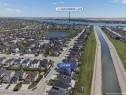248 Rainbow Falls Way, Chestermere, AB  - Outdoor With Body Of Water With View 