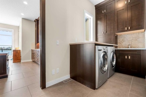 54 Auburn Sound Place Se, Calgary, AB - Indoor Photo Showing Laundry Room