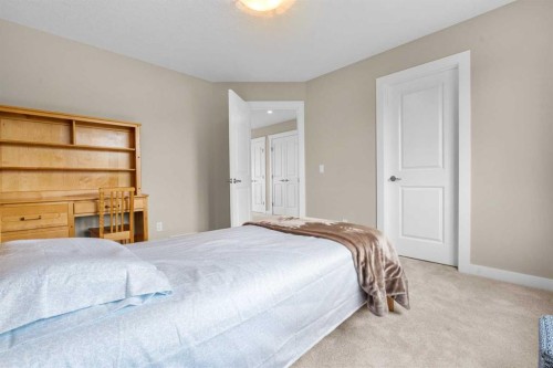54 Auburn Sound Place Se, Calgary, AB - Indoor Photo Showing Bedroom