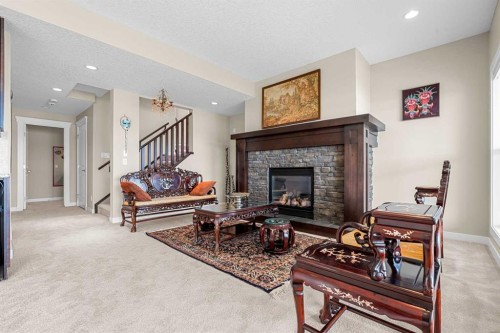 54 Auburn Sound Place Se, Calgary, AB - Indoor Photo Showing Living Room With Fireplace