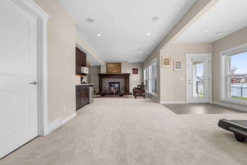 54 Auburn Sound Place Se, Calgary, AB - Indoor With Fireplace