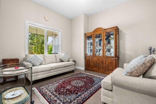 54 Auburn Sound Place Se, Calgary, AB - Indoor Photo Showing Living Room