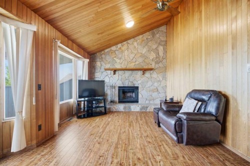 56 Whitworth Place Ne, Calgary, AB - Indoor Photo Showing Living Room With Fireplace