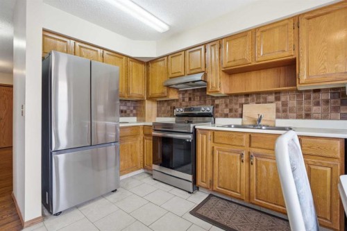 56 Whitworth Place Ne, Calgary, AB - Indoor Photo Showing Kitchen With Double Sink