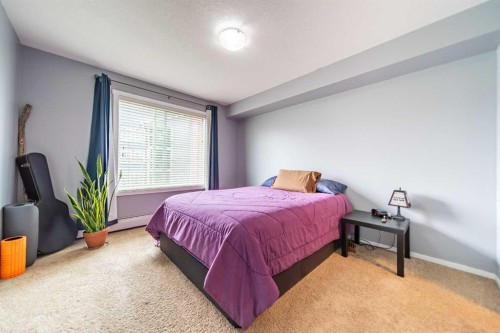 4318-99 Copperstone Park Se, Calgary, AB - Indoor Photo Showing Bedroom