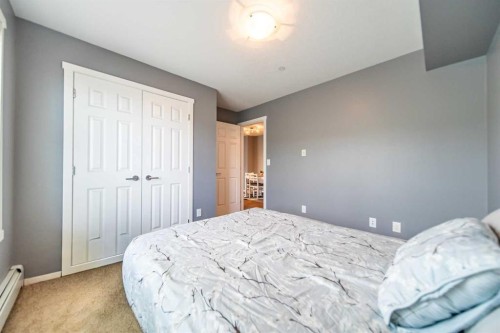 4318-99 Copperstone Park Se, Calgary, AB - Indoor Photo Showing Bedroom