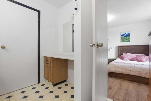 437 Maplewood Se, Diamond Valley, AB - Indoor Photo Showing Bedroom