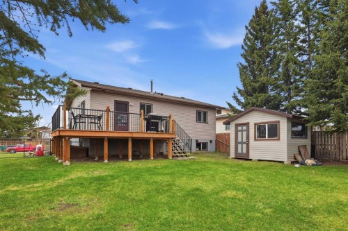 437 Maplewood Se, Diamond Valley, AB - Outdoor With Deck Patio Veranda