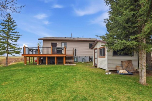 437 Maplewood Se, Diamond Valley, AB - Outdoor With Deck Patio Veranda
