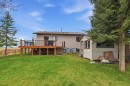 437 Maplewood Se, Diamond Valley, AB  - Outdoor With Deck Patio Veranda 