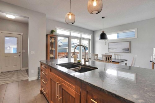145 Marquis Common Se, Calgary, AB - Indoor Photo Showing Kitchen With Double Sink