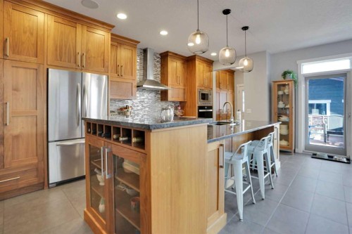 145 Marquis Common Se, Calgary, AB - Indoor Photo Showing Kitchen With Stainless Steel Kitchen With Upgraded Kitchen