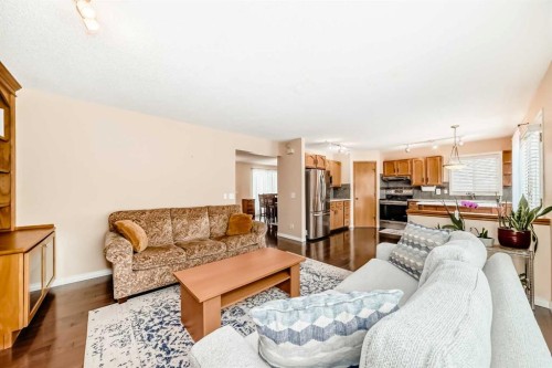 327 Hidden Ranch Circle Nw, Calgary, AB - Indoor Photo Showing Living Room